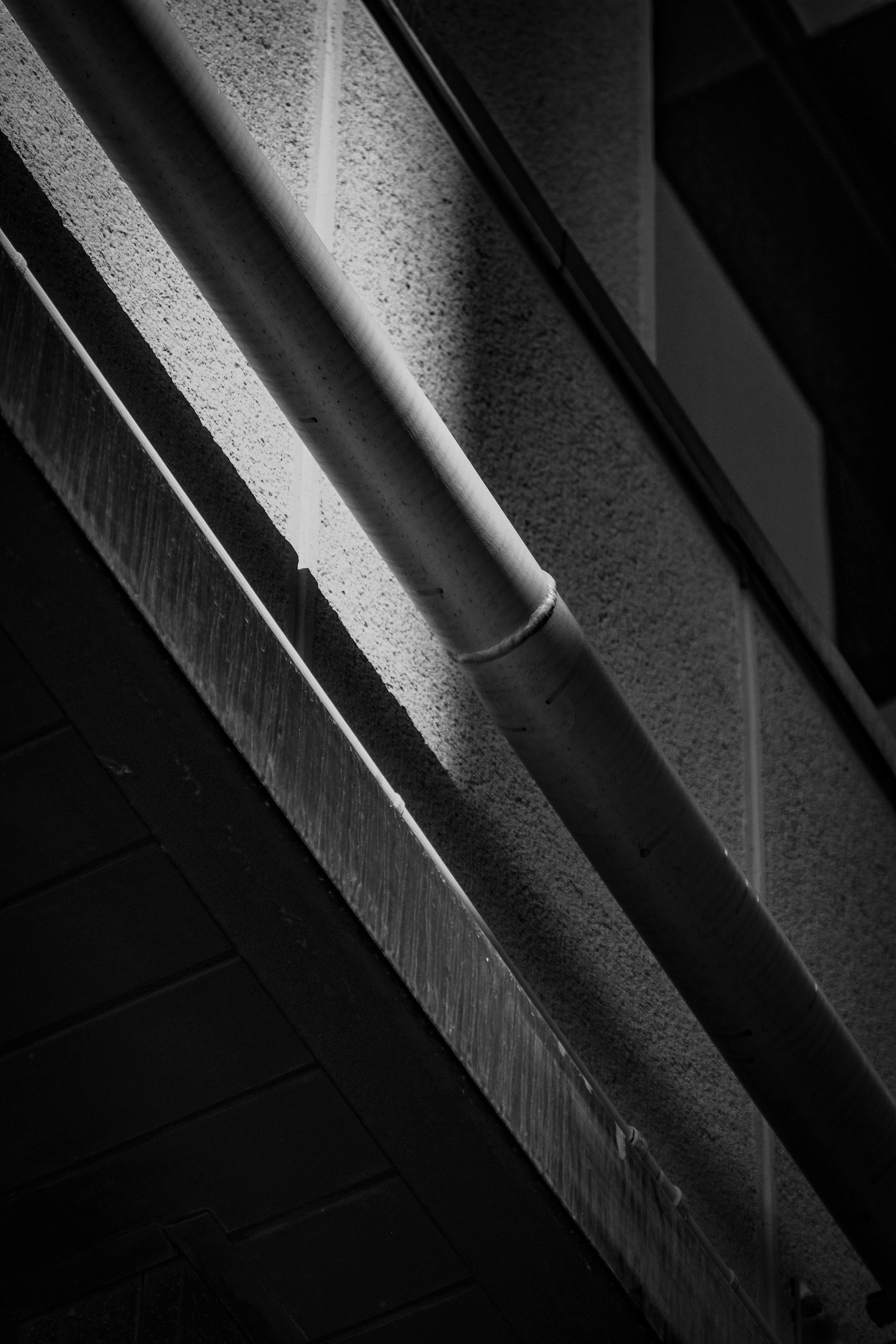 A singular pipe along a wall